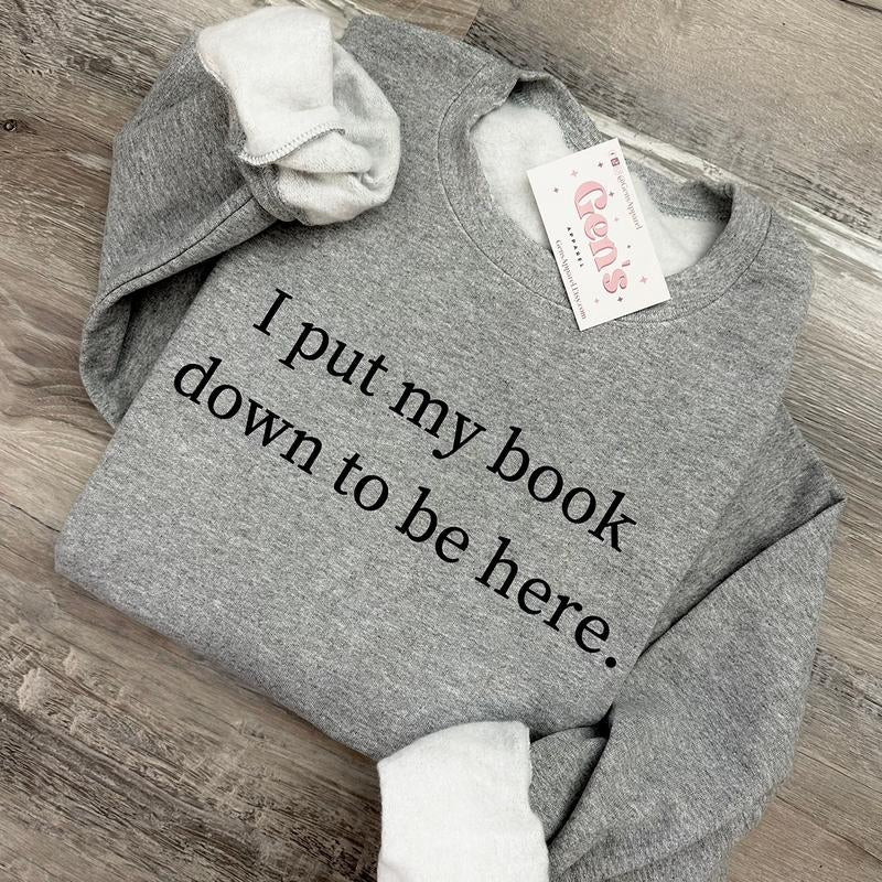 Cozy "I Put My Book Down to Be Here" Sweatshirt - Perfect Gift for Book Lovers and Bookworms!